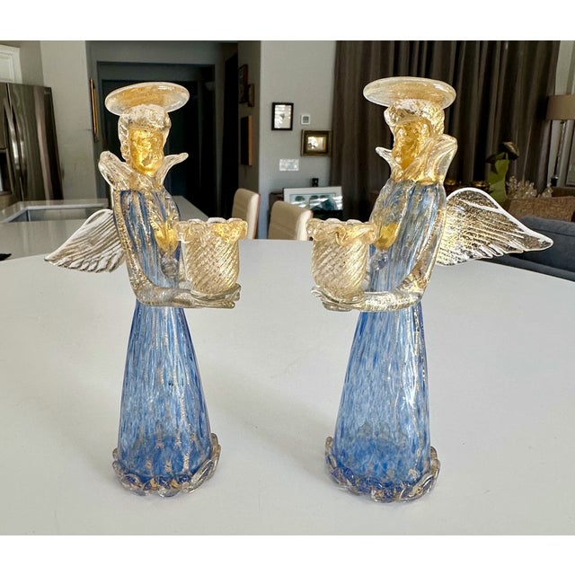 Pair of Murano Italian Venetian art glass Angel candleholder figurines. The color of the glass is combination blue and...