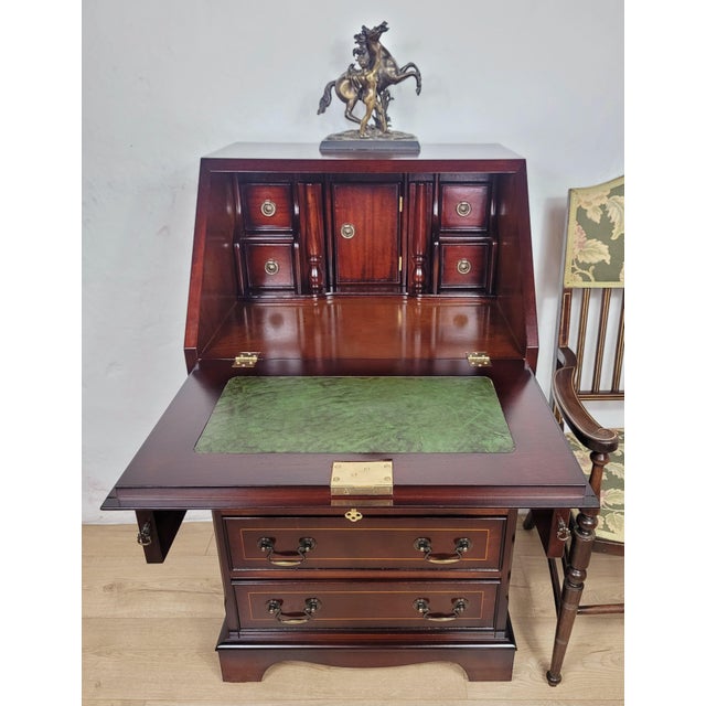 This beautiful 20th-Century writing bureau desk would make for a wonderful addition to a Vintage living room or office...