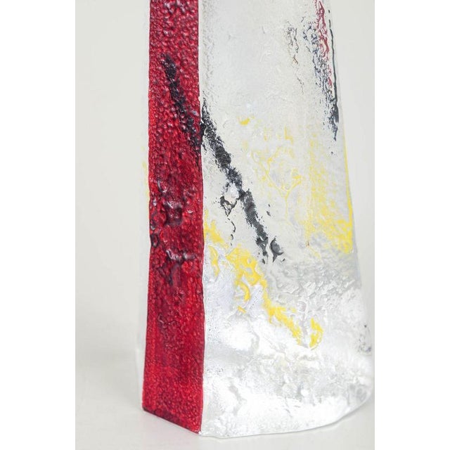 Johansfors, Sweden Art glass sculpture object, 1980s. Tall triangular art-glass sculpture in clear glass featuring a bold...