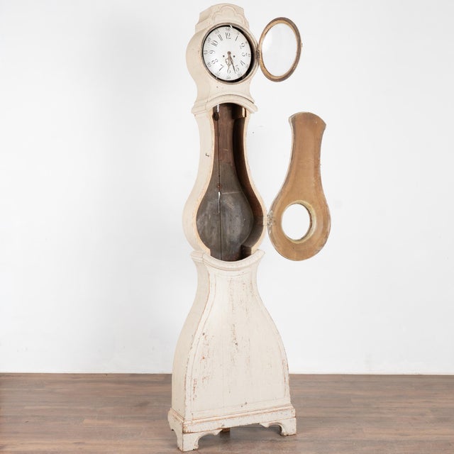Swedish mora grandfather clocks are identified by their gentle curves and classic style as seen in this exceptional...