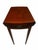 Elegant vintage Mersman drop-leaf accent table crafted in the Federal tradition, featuring a rich mahogany-toned finish,...