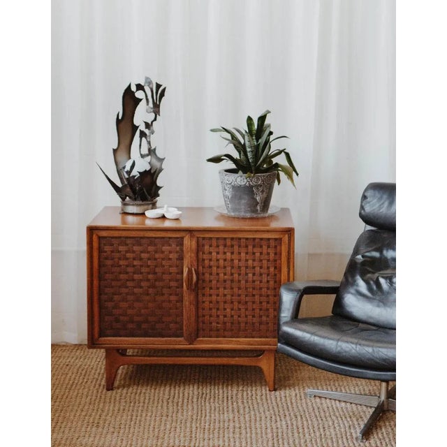 This Lane Perception record cabinet has all the mid-century charm—clean lines, warm walnut tones, and those signature...