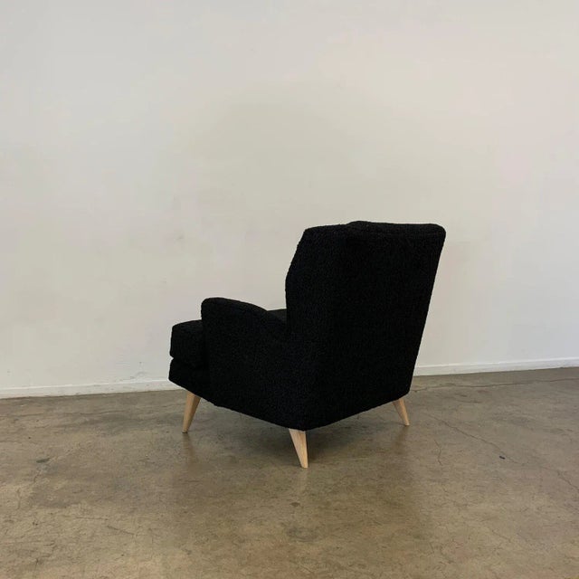 W31 D37 H33 SW21 SD22.5 SH17.5 AH7.5 Custom made, entirely in house all in black Sherpa with solid birch legs. The seat is...