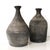 Weathered antique handcrafted clay jug vase. Hand-thrown vases were made and shaped by hand and fired in a wood-burning...