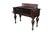 This exceptional antique mahogany spinet desk features a classic conversion-style design, showcasing a rich, deep reddish-...