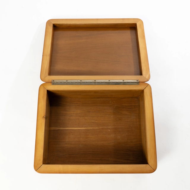 This unique burl wood box can be used as decor or storage. It could be show cased on a large coffee table.