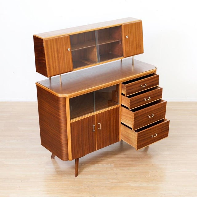 Designed and manufactured by Homeworthy UK, this elegant mid-century Credenza and hutch is a beautifully proportioned...