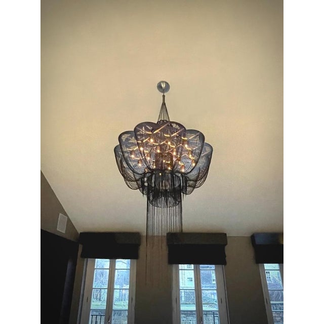 A modern black laser cut steel chandelier by south african lighting atelier willowlamp, the flower of life chandelier...