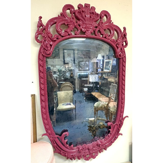 Striking antique solid wood wall mirror from the late 19th century. The Rococo and Baroque style mirror is made of solid...