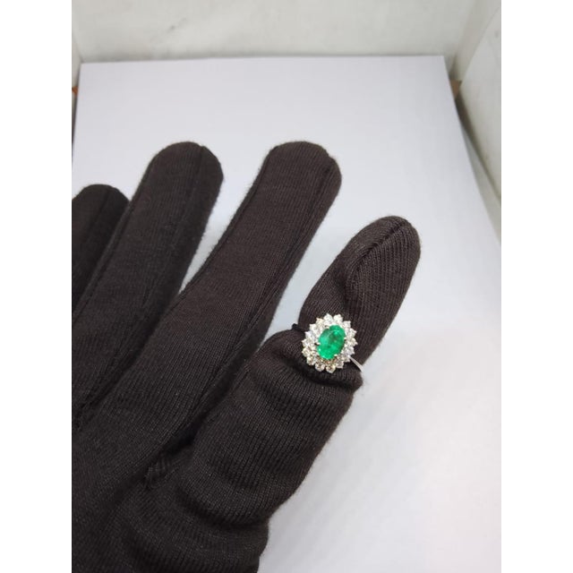 Gemstone details Gold Purity: 18K Solid Gold Emerald: 0.98 cts Diamond: 0.64 cts 18K gold Net weight: 3.11 grams Gross...