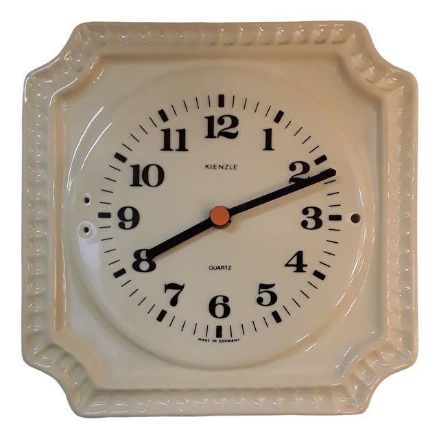 Vintage German Wall Clock in Cream-Colored Ceramics with Black Hands and Digits with Orange Point from Kienzle, 1970s For Sale