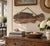 A wonderfully primitive early-to-mid-20th-century hand-carved wooden fish, believed to have originally hung at a seaside...