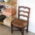 Beautiful carved wood chair from France, 1940s. Intricate carved wood legs and wood frame with scroll detail. Original...