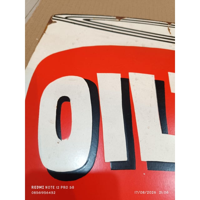This antique and rare OILZUM sign is a must-have for collectors of gas and oil memorabilia. The sign is made of metal and...