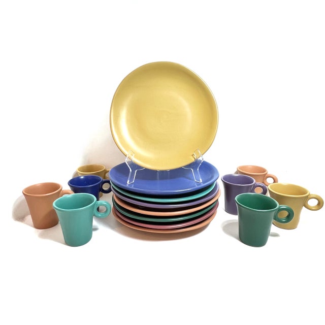 Colorful dinnerware set of plates and mugs by Luna Garcia—an influential studio art pottery brand based out of Venice...