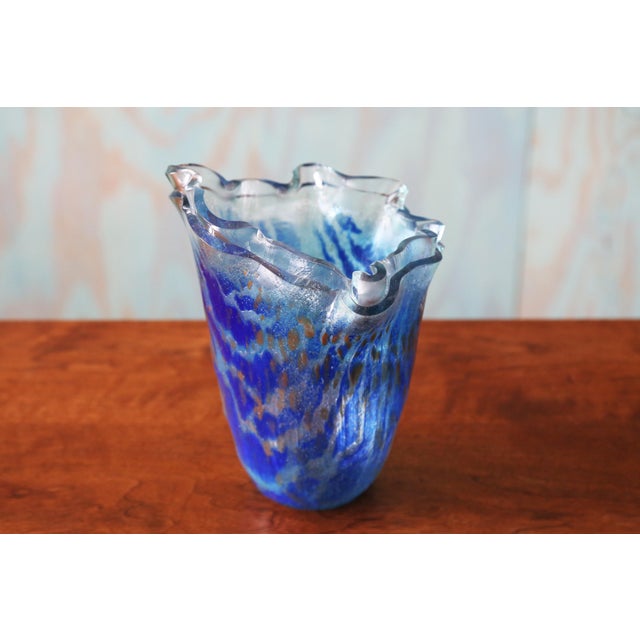 A handmade art lgass vase by Anactcia handmade in Greece. Beautiful double stacked vase form with blue accents. Marked....