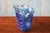 A handmade art lgass vase by Anactcia handmade in Greece. Beautiful double stacked vase form with blue accents. Marked....