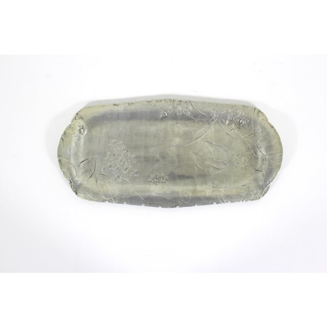 This MCM handmade tray is so pretty. Rectangular aluminum vintage tray with a dogwood floral pattern. The surface is in...