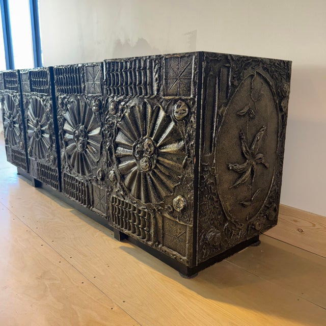 Adrian Pearsall ‘Goop’ Brutalist Console. This large, four door console features resin carvings highlighted in silver and...