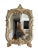 Vintage Serge Roche style wall mirror. Beautiful curved details. Perfect for an entry way or small bathroom mirror. A...