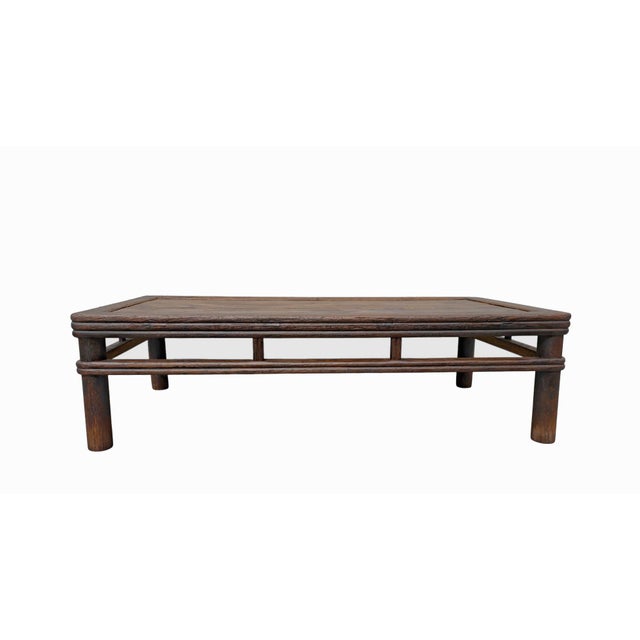 This 18th century rectangular coffee table is made from solid wood with a weathered, natural grain finish. Designed with...