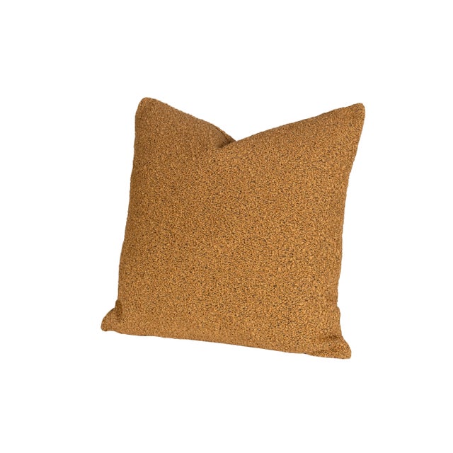 Frameworks down pillows. Measured 22" by 22" and made with vintage boucle in Carmel.