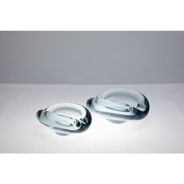 This set consists of two ashtrays from the Akva series from the Danish glass manufacturer Holmegaard. Both were designed...