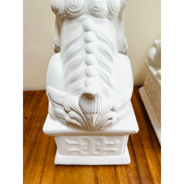 Late 20th Century Chinoiserie 17” Tall Matt White Finish Ceramic Food Dog Pair For Sale - Image 5 of 10