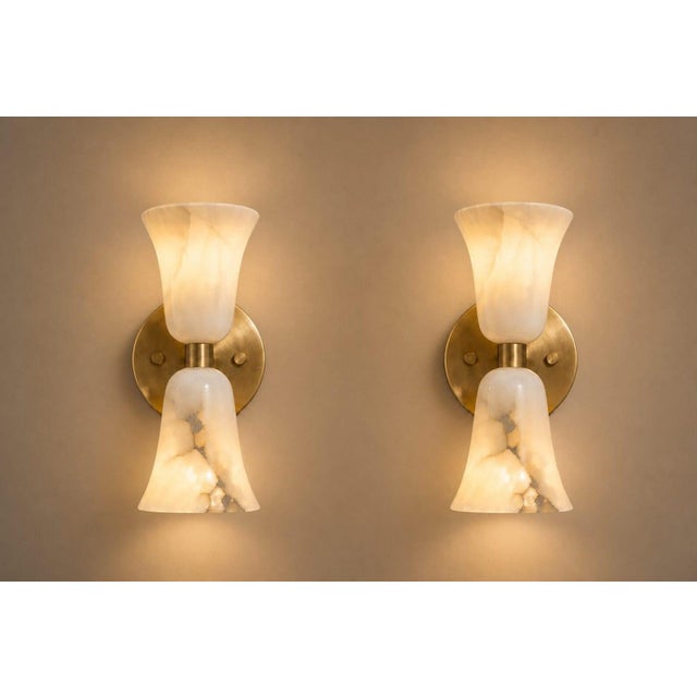 Bring warm, diffused light and natural stone character to your interior with this pair of handcrafted brass and natural...
