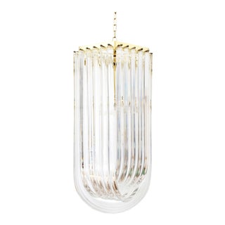 Hollywood Regency Lucite Ribbon and Brass Chandelier For Sale