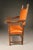 An elegant pair of 19th-century Italian armchairs in the Baronial style, dating to circa 1860. Crafted from carved walnut,...