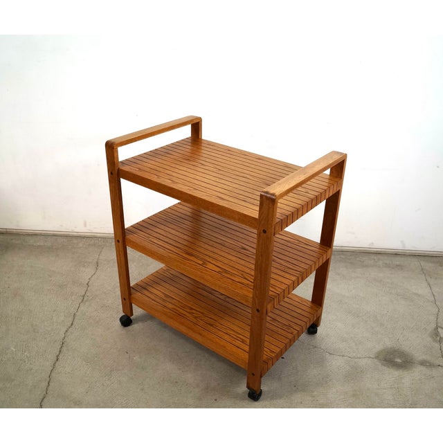 Vintage Midcentury Modern bar cart for sale. It was manufactured in the 1970's and is in excellent condition. It's in the...