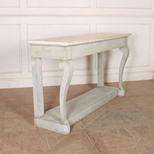 Pretty early 19th century French marble topped console table with one long drawer. 1820. This piece is designed in the...