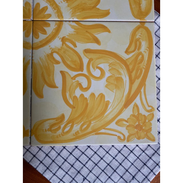Beautiful set of 4 Italian tiles from the 1960’s. Hand painted yellow and white motifs. I have two of these sets...