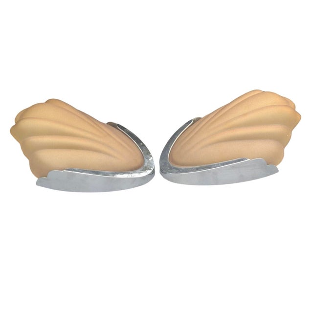 A pair of 1920s Art Deco Wall Lights. The shades are of crocus design and in a beautiful soft amber. Shells are original...