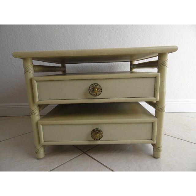 McGuire table with two drawers with original hardware and original finish. Formica top. Tag inside.