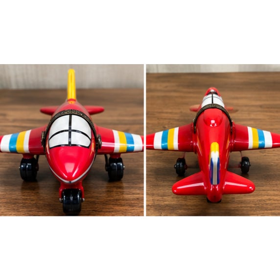 Charming miniature porcelain hinged trinket box designed in the form of a colorful red airplane. The airplane features a...