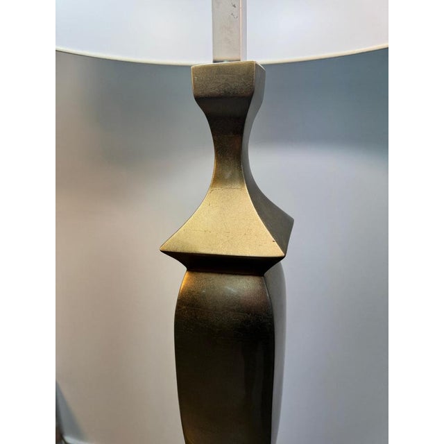 A rare early 1970s pair of sculptural & architectural gold metal floor lamps designed and produced by alberto smania for...