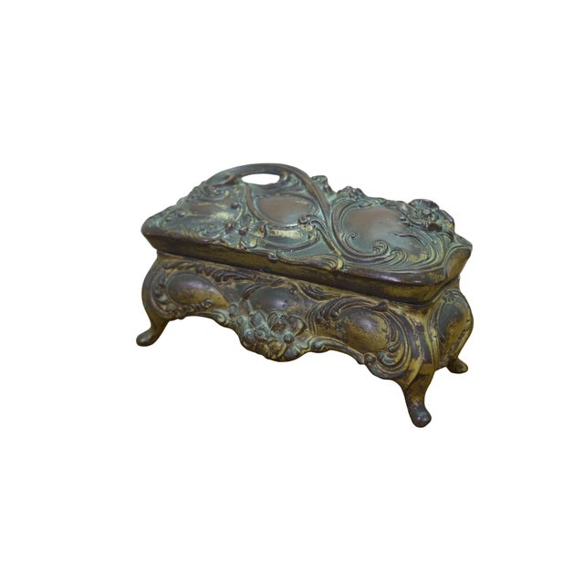 Antique Art Nouveau Brainard & Wilson (B&W) footed brass or spelter jewelry casket dresser box featuring an ornate high...
