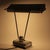 This lamp was designed by Eileen Gray for Jumo in France. It is made from corrugated steel, originally grey painted and...