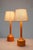 A striking and elegantly proportioned pair of vintage Swedish oak table lamps, designed and produced in the 1960s by Elpe...
