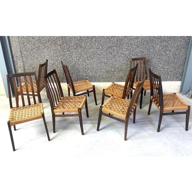 Beautiful and elegant dining chairs made from teak and with their original untouched cord seats. These have been used with...
