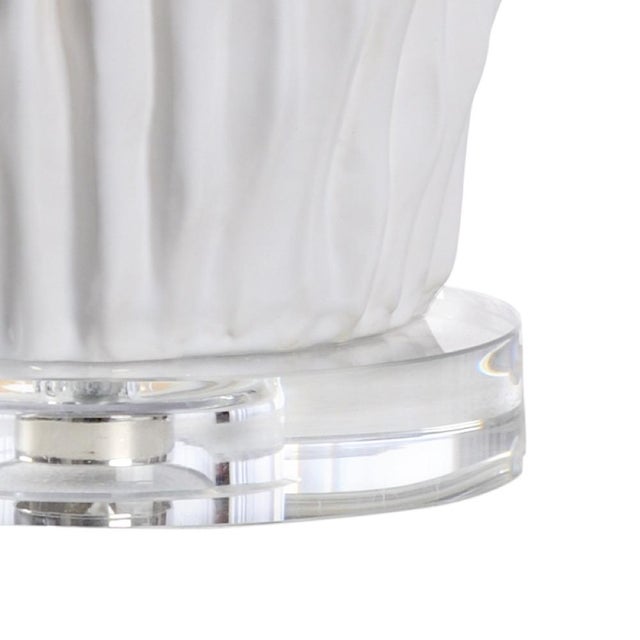 Inspired by the texture of the great saguaro cacti. This modern ceramic version with gloss white glaze and a clear crystal...