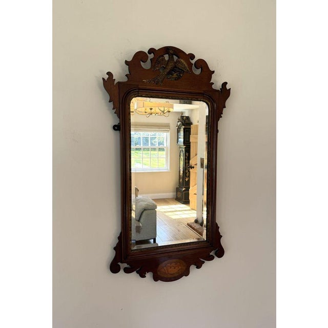 Large antique Edwardian inlaid and gilt mahogany fretted wall mirror, having a quality antique mahogany wall mirror having...