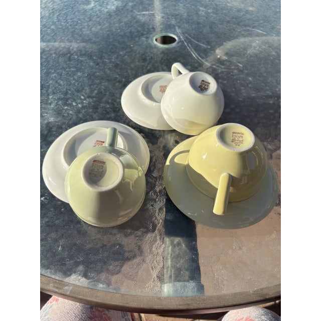 Russel Wright set of 3 cups and Saucers, 1 all White, 1 all Yellow, 1 Light Green Cup and White Saucer plus 2 extra Powder...