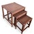 This set of vintage nesting tables offers a stylish and functional solution for adding natural charm to your living space....
