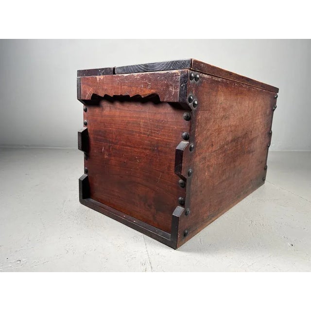 Wooden storage trunk finished with metal studs, with removable lid. Beautifully designed in warm, beautiful wood. Perfect...