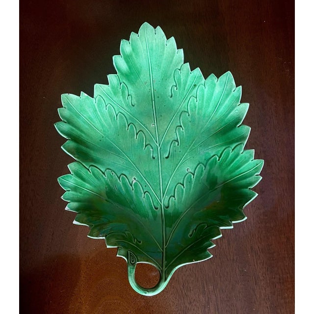 Antique early 19th century English green glazed creamware leaf shaped dish. Wonderful relief detail with branch handle....