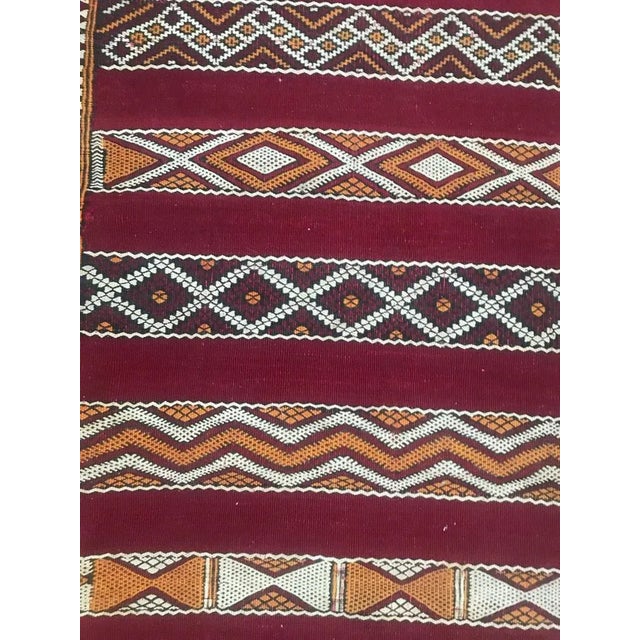 Beautiful early 20th century flat-woven Moroccan berbere runner with beautiful tribal design and red and orange colors....