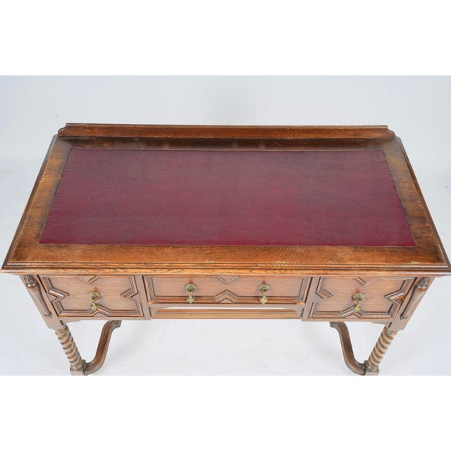 Antique Barley-Twist Oak Writing Desk With Burgundy Leather Top, Jacobean Revival Richly figured oak, sculptural barley-...